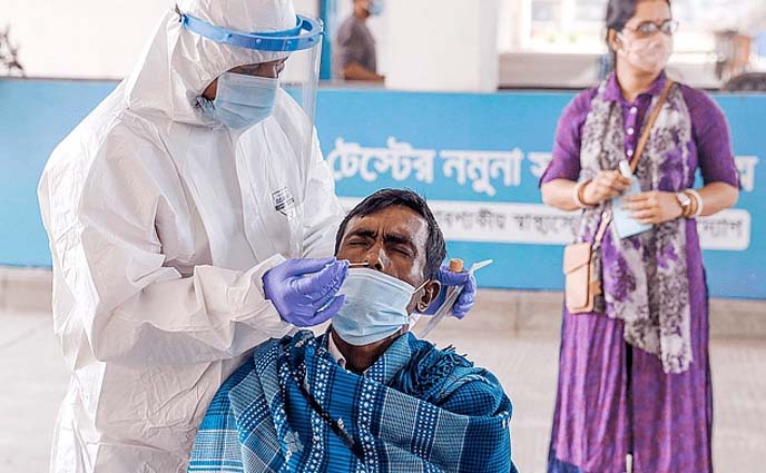 করোনাভাইরাস: শনাক্তের হার নেমে এল তিনের নিচে